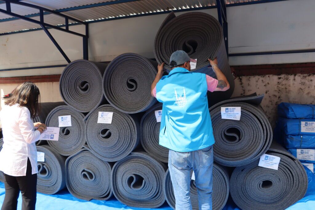 Each shelter kit includes essential items such as tarpaulins, blankets, pillows, and foam mattresses