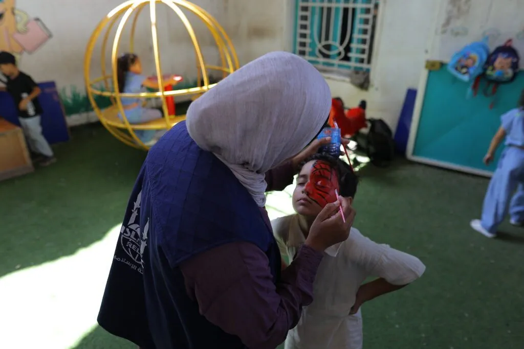 Children in Gaza enjoy a moment of respite at one of the temporary learning centres supported by Islamic Relief