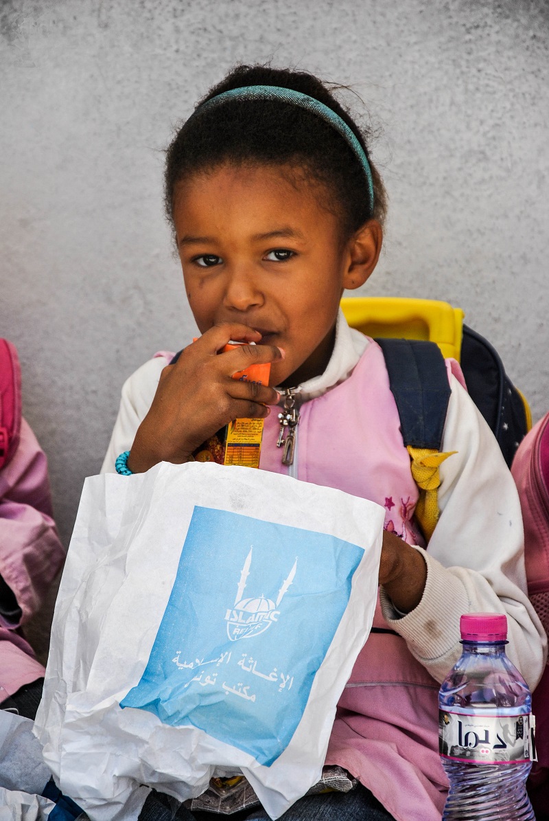 Mabrouka Alhafyen, 7, received a snack and bottled water on school-days.