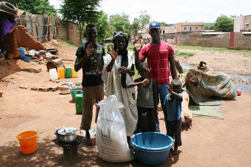 Wassa and her family with their food parcel