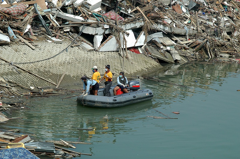 Relief workers looking for survivors after the 2004 tsunami.