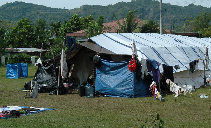 Many people lived in camps until their permanent homes were built.