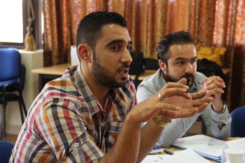 Participants in the five-day course for staff in Jordan and Lebanon discuss the needs of vulnerable children.