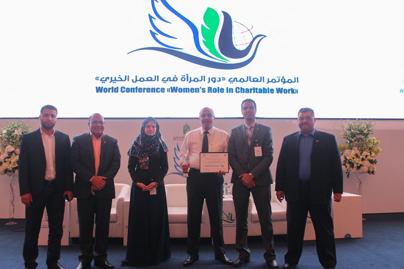 The team at the conference in Kuwait.