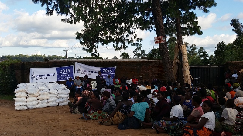 Staff distribute aid following the floods in Malawi