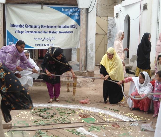 A women’s community organisation works on a Village Development Plan.