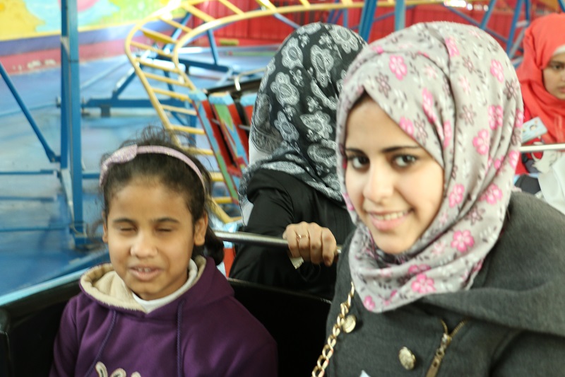 Malak enjoyed helping Amina, 7.