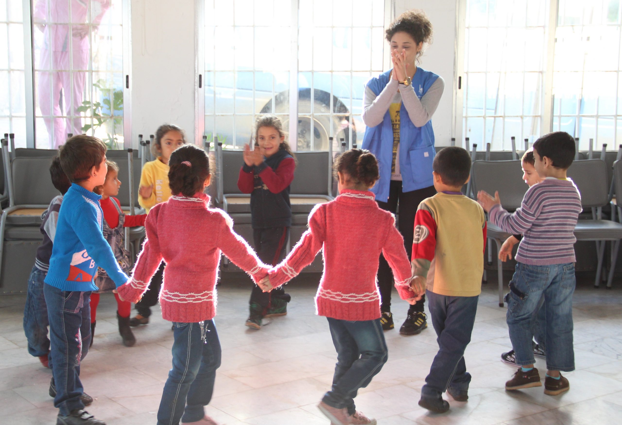 Children playing together as part of the project