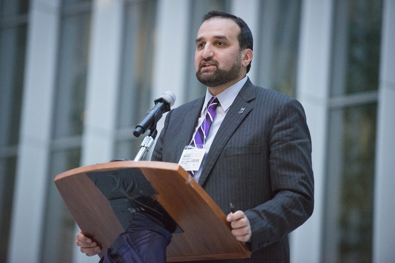 CEO of Islamic Relief USA, Anwar Khan, speaking at a partnership-building iftar held at conference.