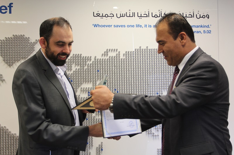 Caption: On behalf of Islamic Relief Worldwide, our Director of International Programmes accepts a certificate of appreciation from Awat Mustafa, Senior Board Member and Operation Project Director of Barzani Charity Foundation.