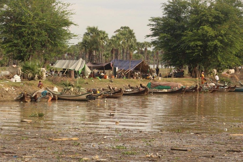 In Shar Pin village, Pakokku, local people take shelter on higher land.