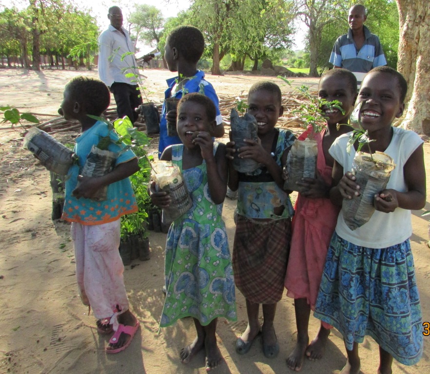 Some excited recipients of the tree seedlings at Ndakwera Primary School, Chikwawa district.