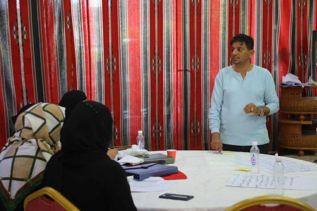 Ahmad training other Yemeni humanitarians 
Training aid workers 
stories from Yemen
Yemen 