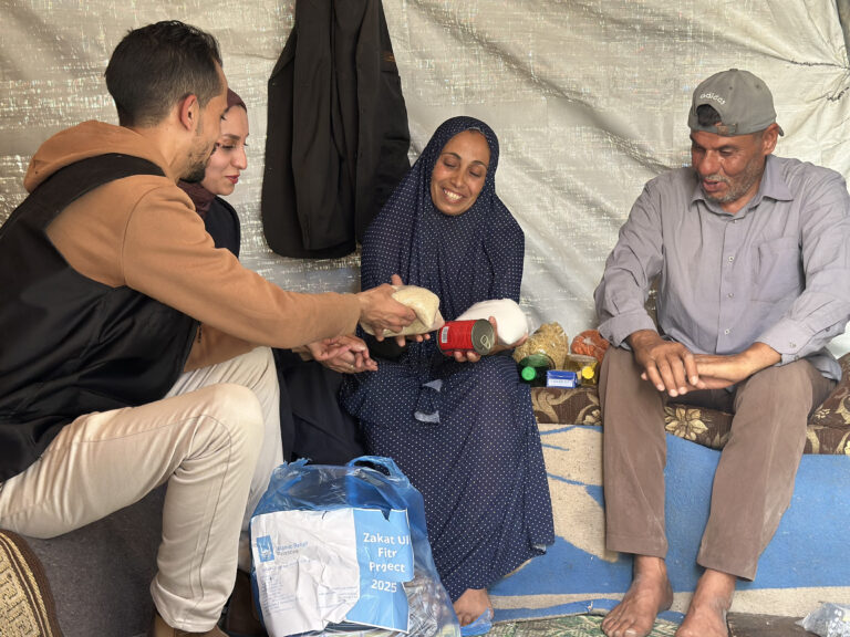 Family in Gaza receiving aid