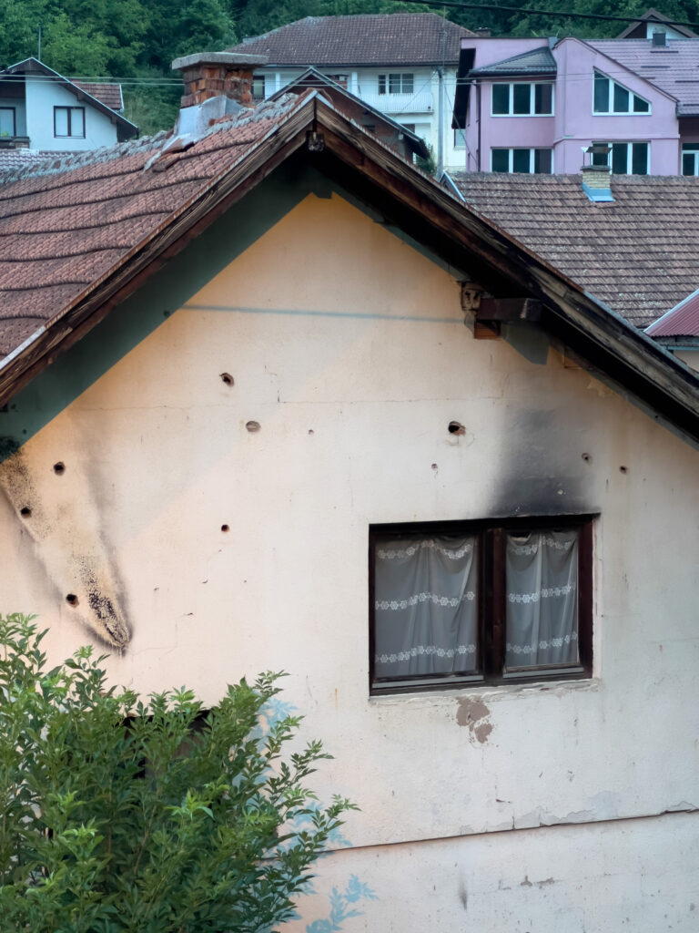 Bullet holes on an abandoned house in Srebrenica